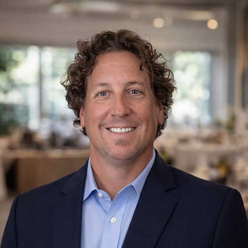 Photo of Derek Mox, President and CFO - a smiling man in a